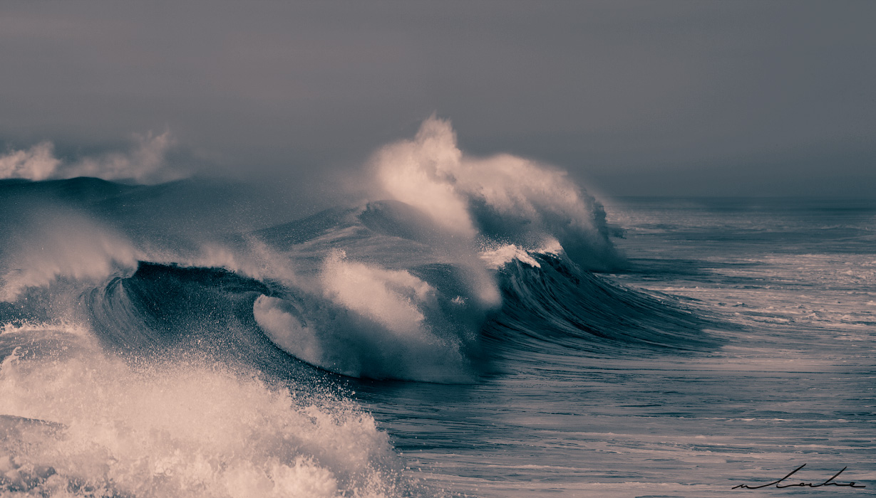 A toned photograph of a tempestuous sea